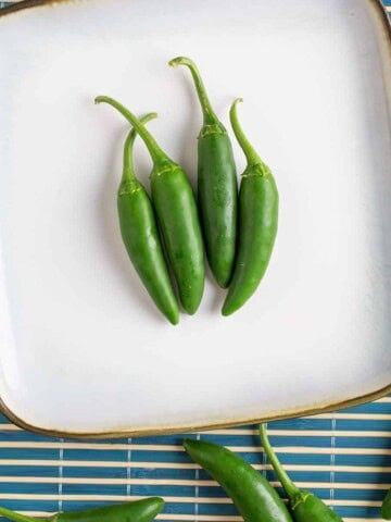 Serrano Peppers on a plate.