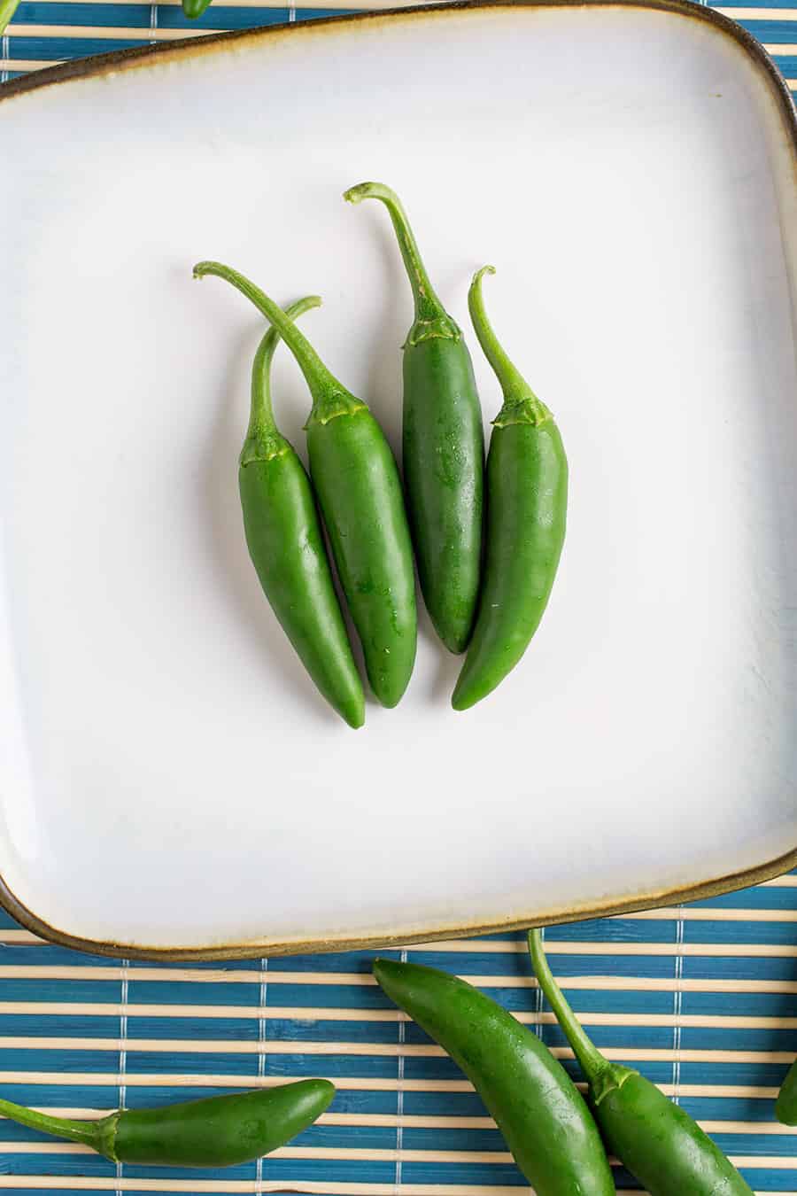 Serrano Peppers on a plate.