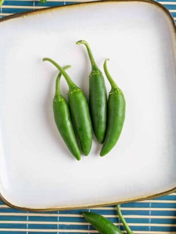 Serrano Peppers on a plate.