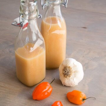 Garlic-Habanero Hot Sauce served in a bottles.