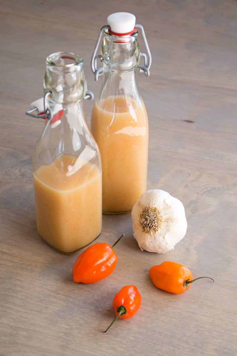 Garlic-Habanero Hot Sauce served in a bottles.
