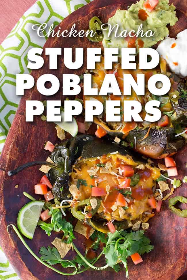 Chicken Nachos Stuffed Poblano Peppers - Take all of your favorite chicken nachos ingredients, stuff them into roasted poblano peppers with loads of cheese, then bake them to gooey perfection. Here is the recipe. | ChiliPepperMadness #StuffedPeppers #StuffedPoblanos #PoblanoPeppers #Nachos #Dinner