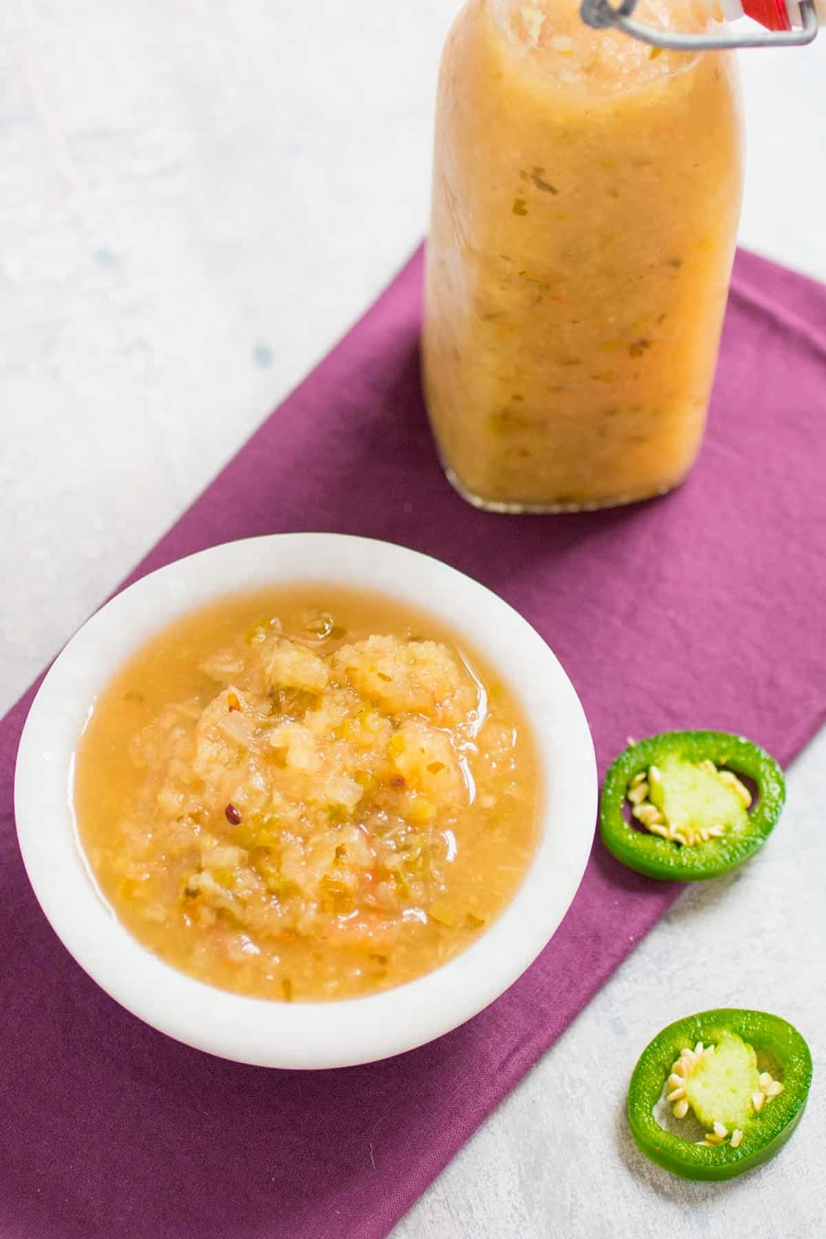 Pineapple Jalapeno Hot Sauce served in a bowl and a jar