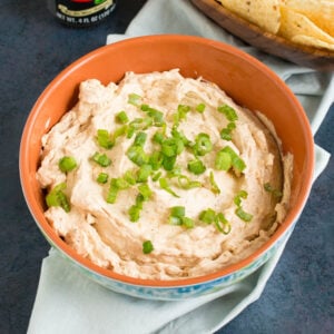 Spicy beer dip served in a bowl.