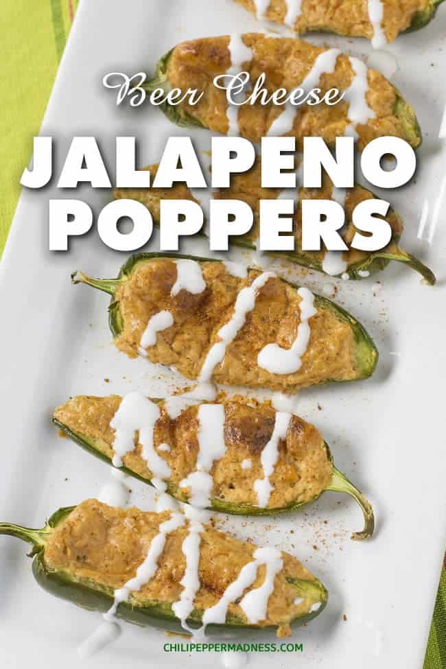 Beer Cheese Jalapeno Poppers - A recipe for jalapeno poppers stuffed with creamy, homemade beer cheese. These are the ultimate appetizer for game day or any party. Bake them up and watch them disappear. | ChiliPepperMadness.com #Appetizer #PartyFood #PartyFoodIdeas #Poppers #JalapenoPoppers #StuffedPeppers