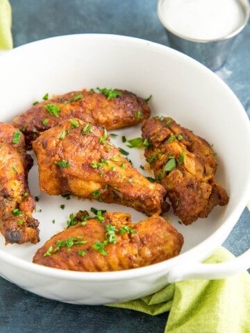 Ancho BBQ Chicken Wings served in a big white bowl