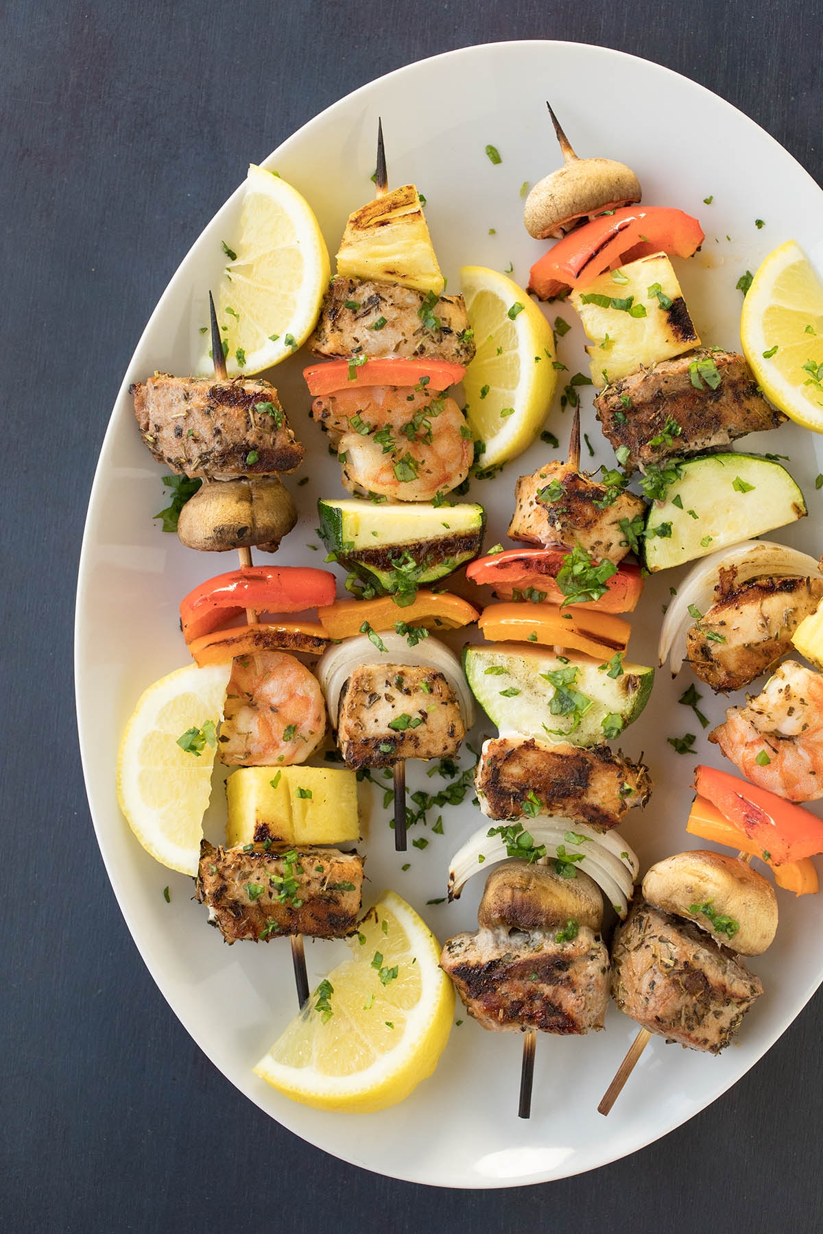 Easy BBQ Skewer Party with skewres served on a a plate.