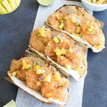 Caribbean Coconut Shrimp Tacos with Pineapple-Mango Salsa served.