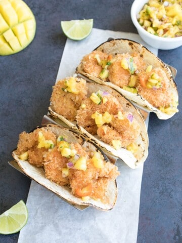 Caribbean Coconut Shrimp Tacos with Pineapple-Mango Salsa served.