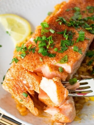 Cajun Baked Salmon with Cajun Rice served