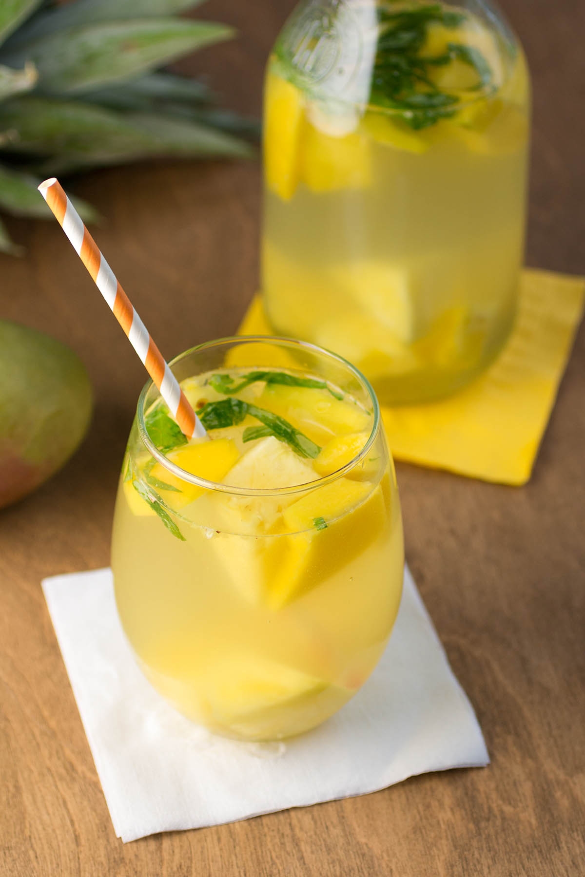 white sangria with pineapple, mango and basil