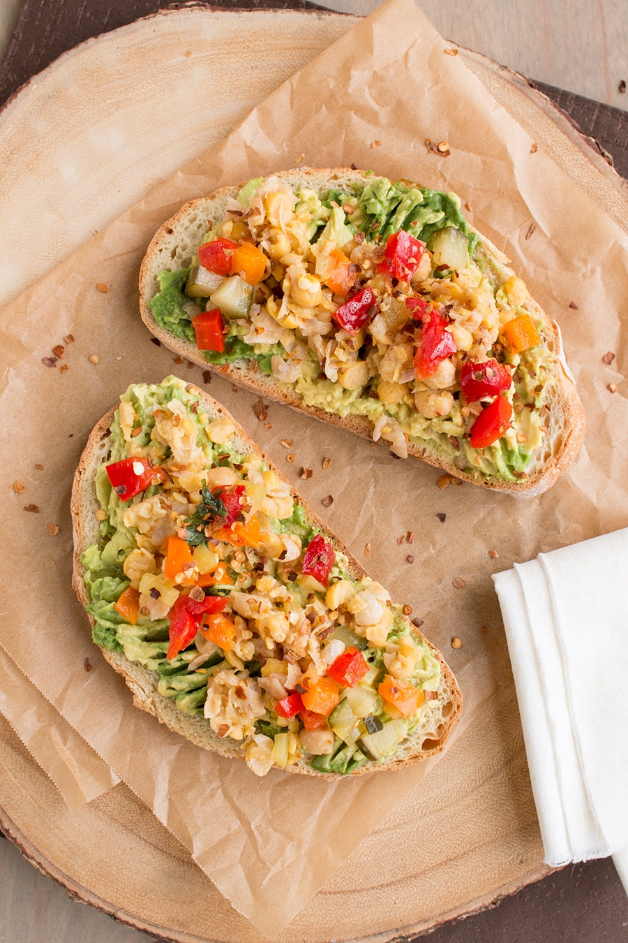 avocado toast with smashed chickpeas and pepper relish