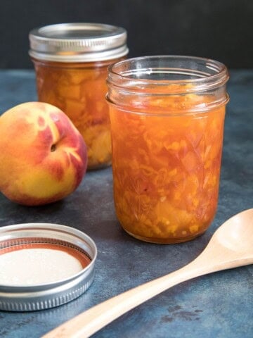 Scotch Bonnet-Peach Pepper Jam served in different jars