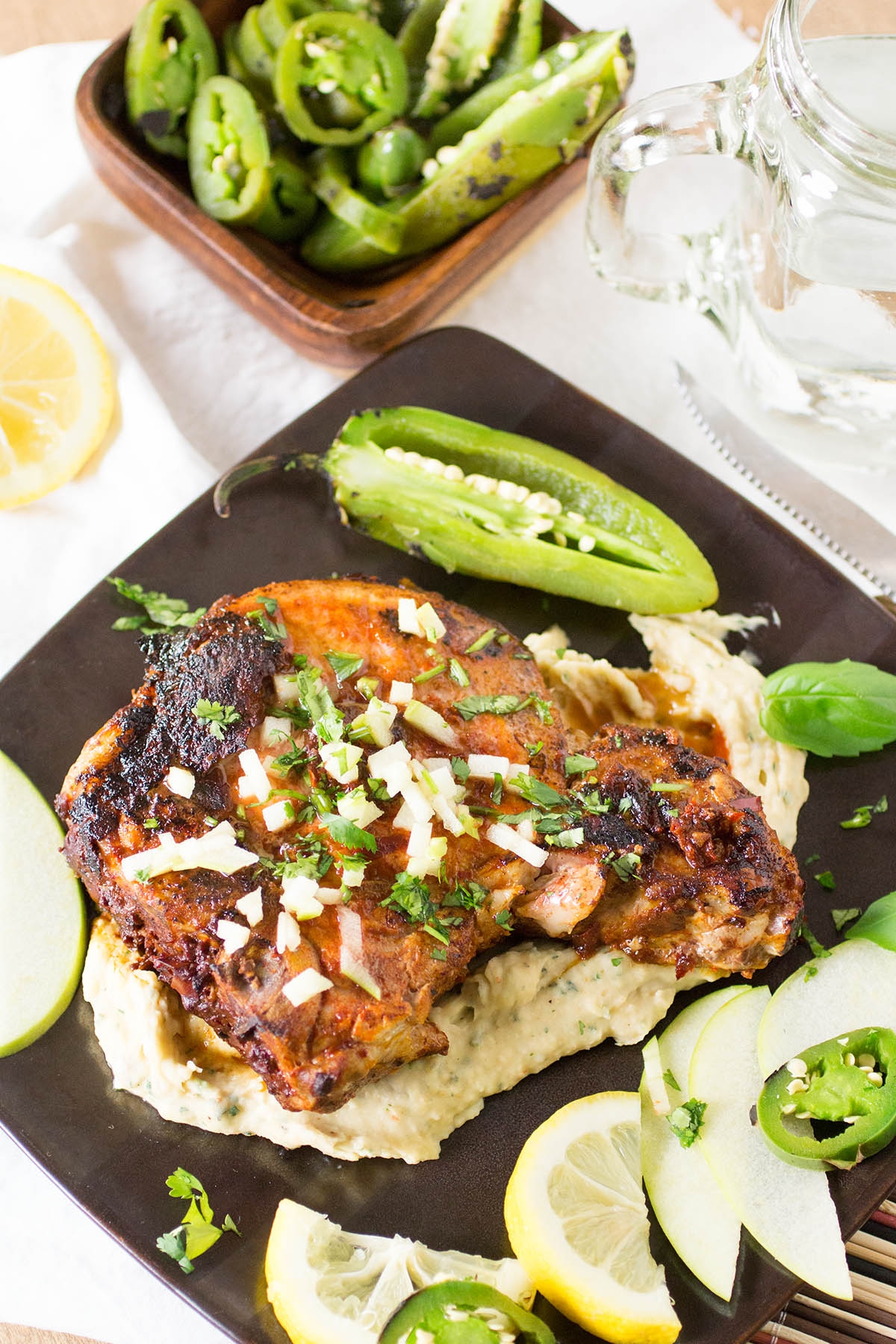 baked pork chops over cheesy white bean puree