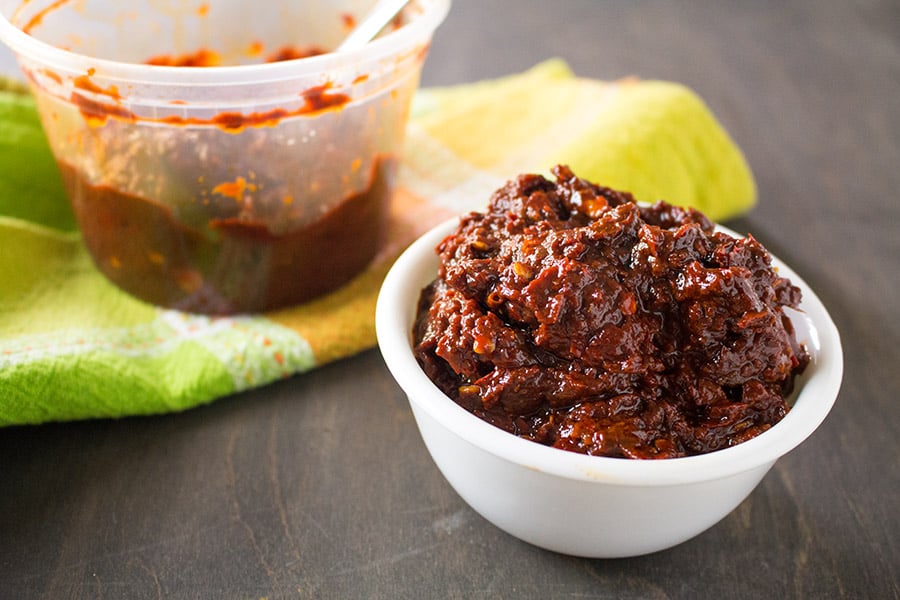 Ancho-Guajillo Chili Paste ready and served in a small white bowl