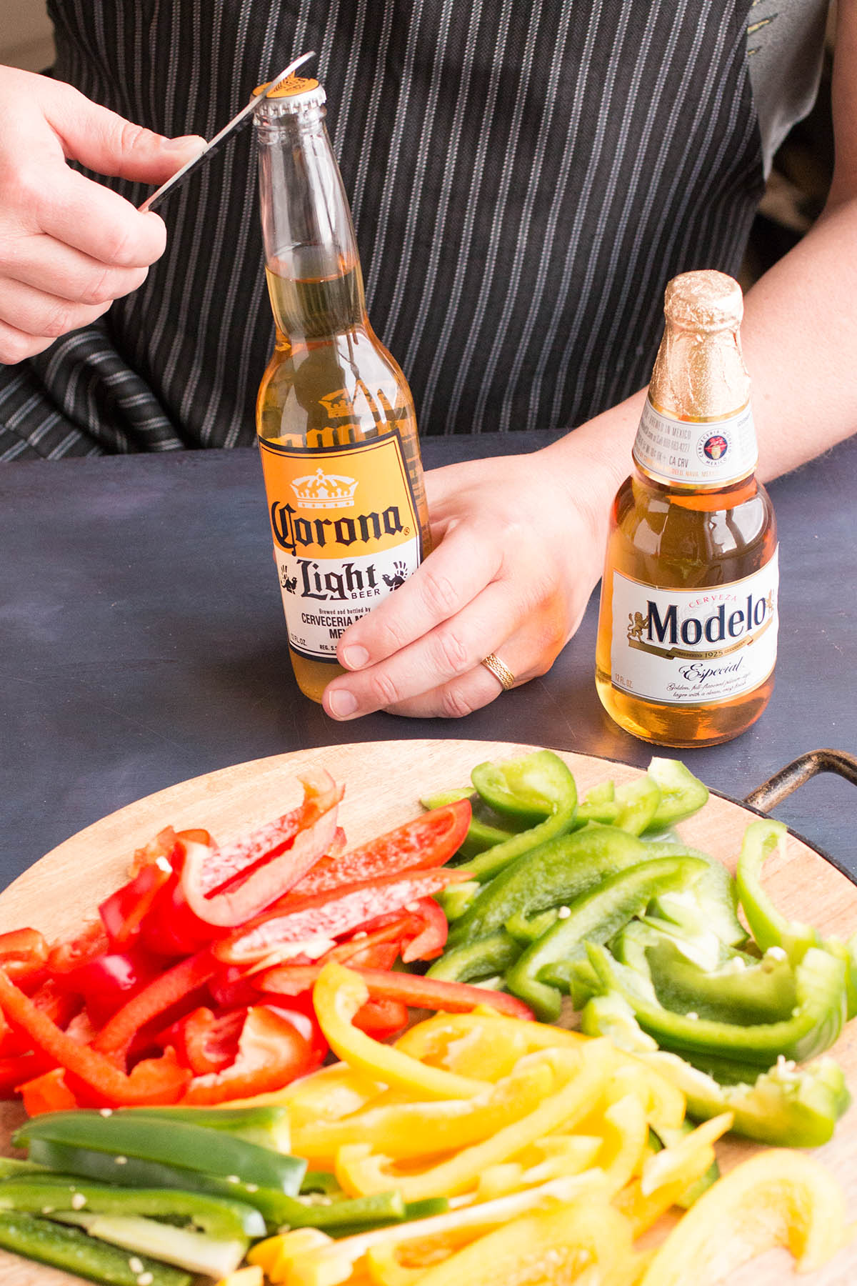 Opening up Corona Light beer to make the recipe.