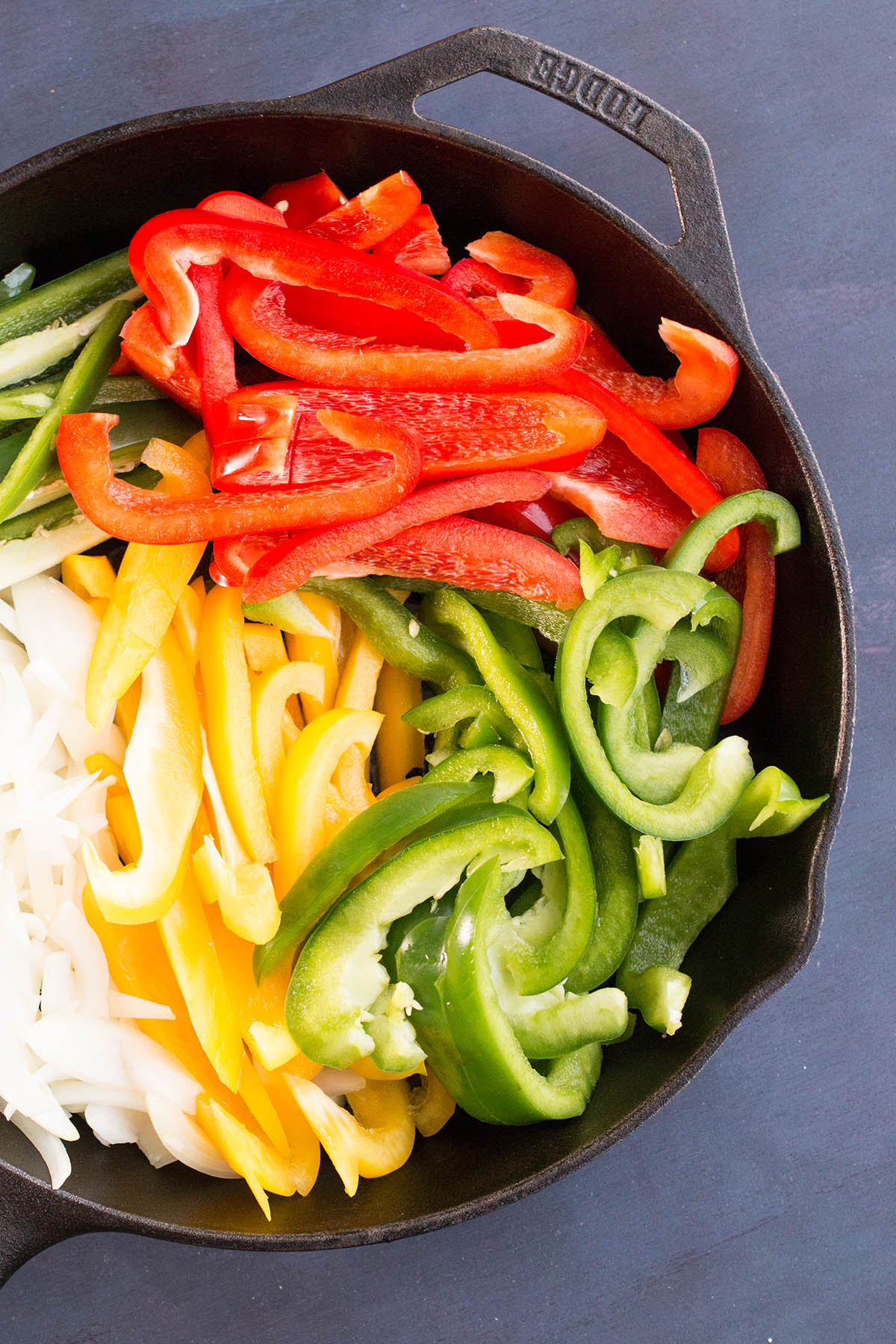 Cooking Peppers and Onions in a big skillet.