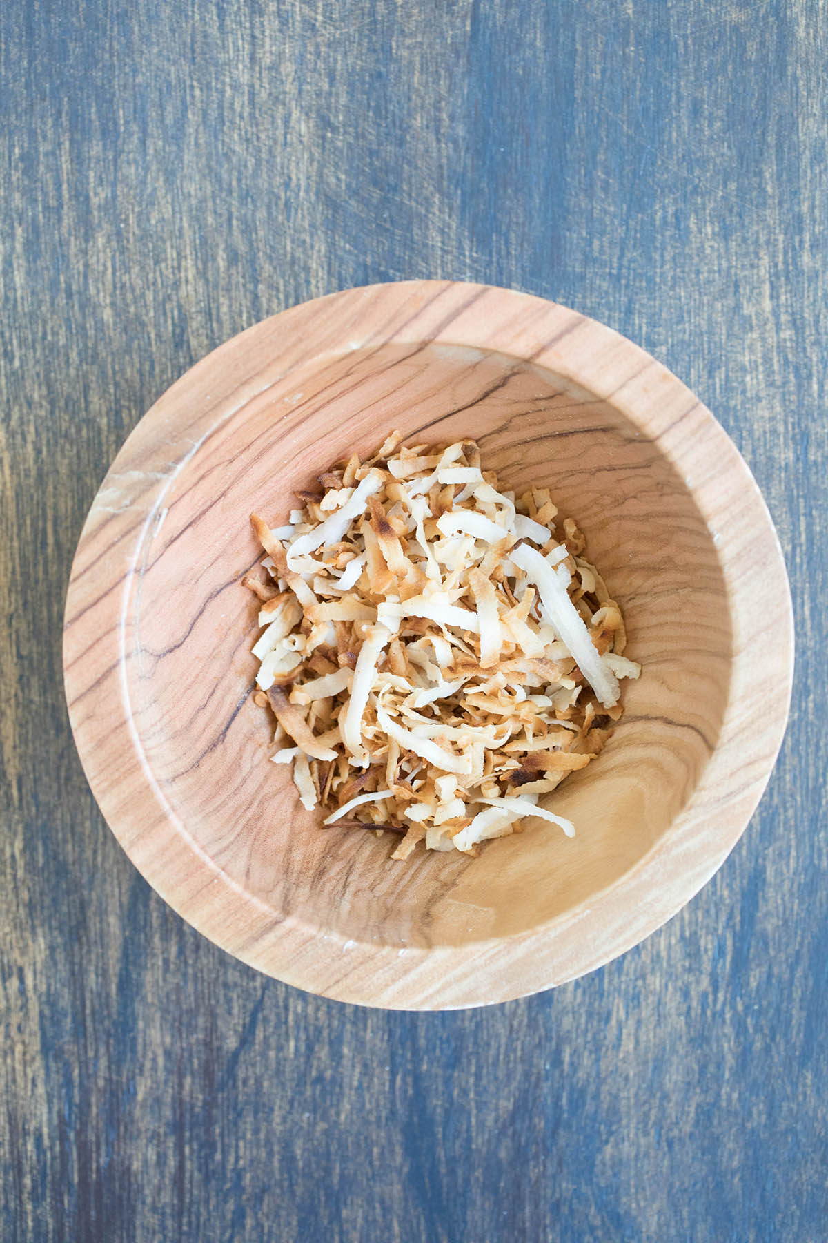 Coconut flakes in a bowl ready for the recipe.