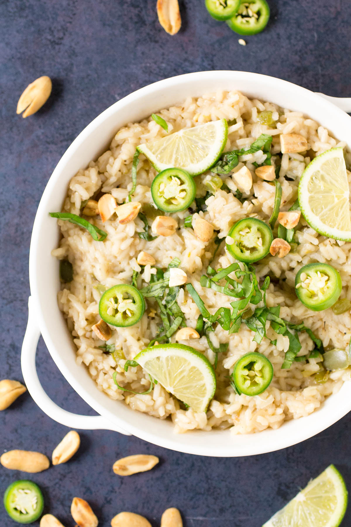 Serving Chili Basil Rice with lime wedges and pepper slices on top