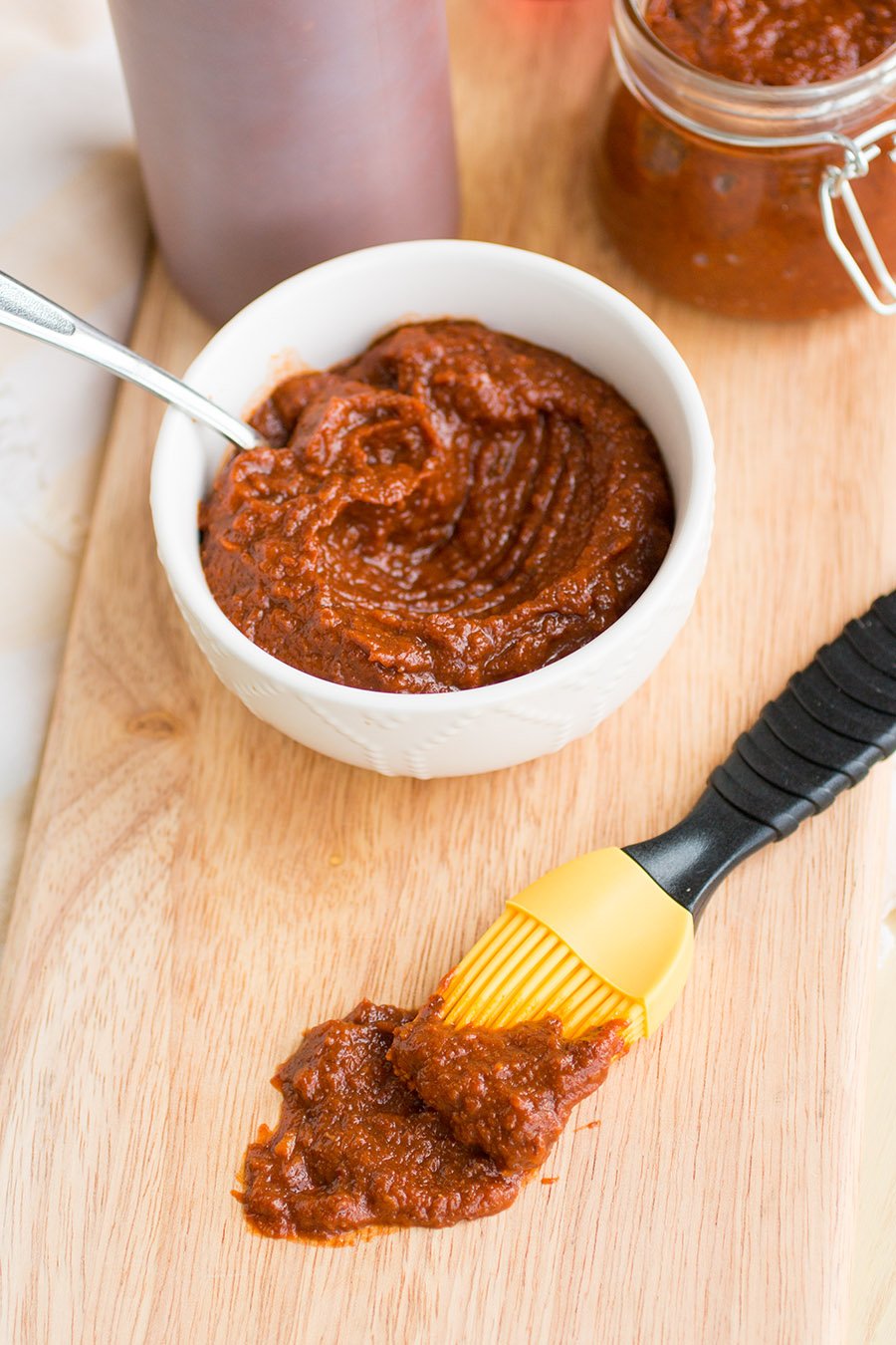 Chipotle-Bacon-Bourbon Barbecue Sauce served in a big white bowl