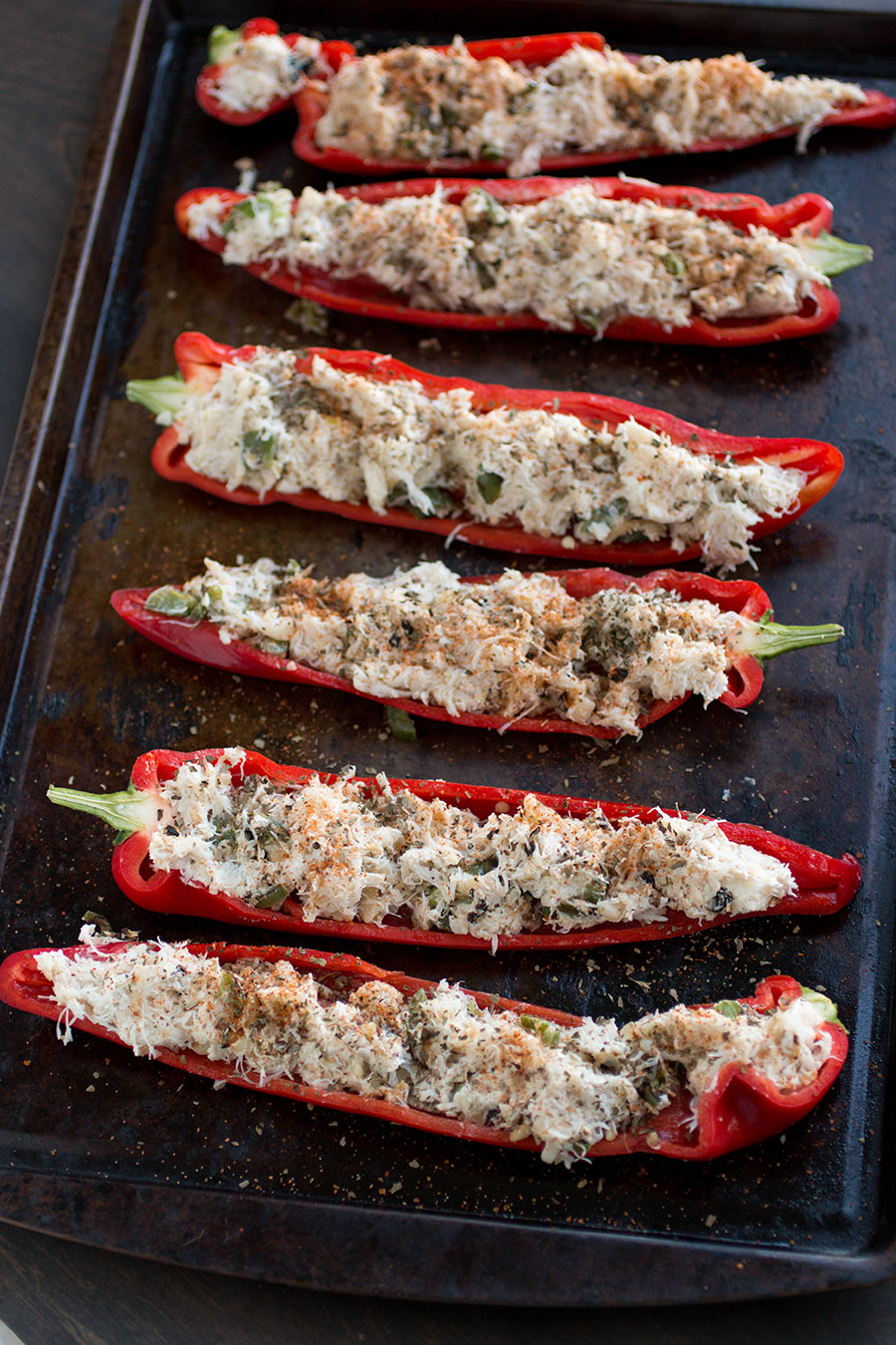 Crab Stuffed Peppers with Lemon-Basil Butter ready for the oven