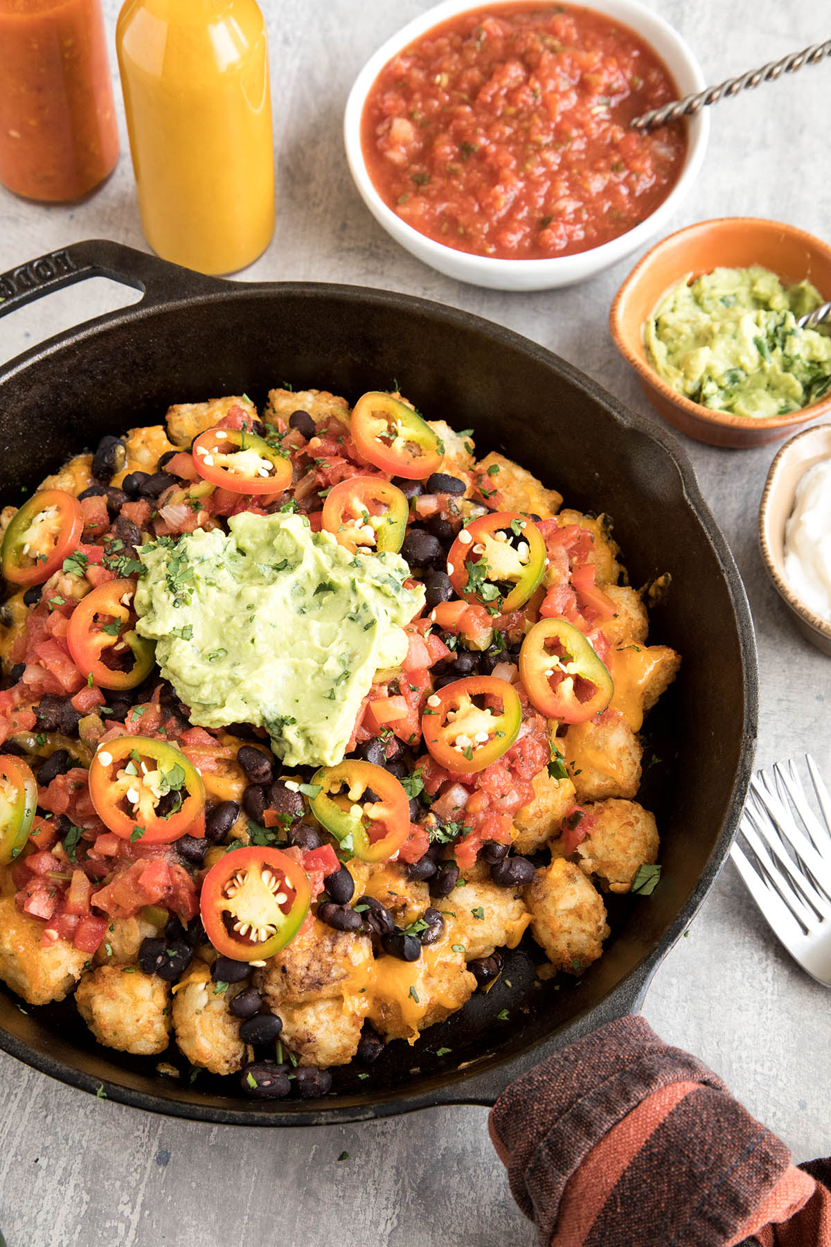 Easy Cheesy Game Day Totchos (Tater Tot Nachos) served.