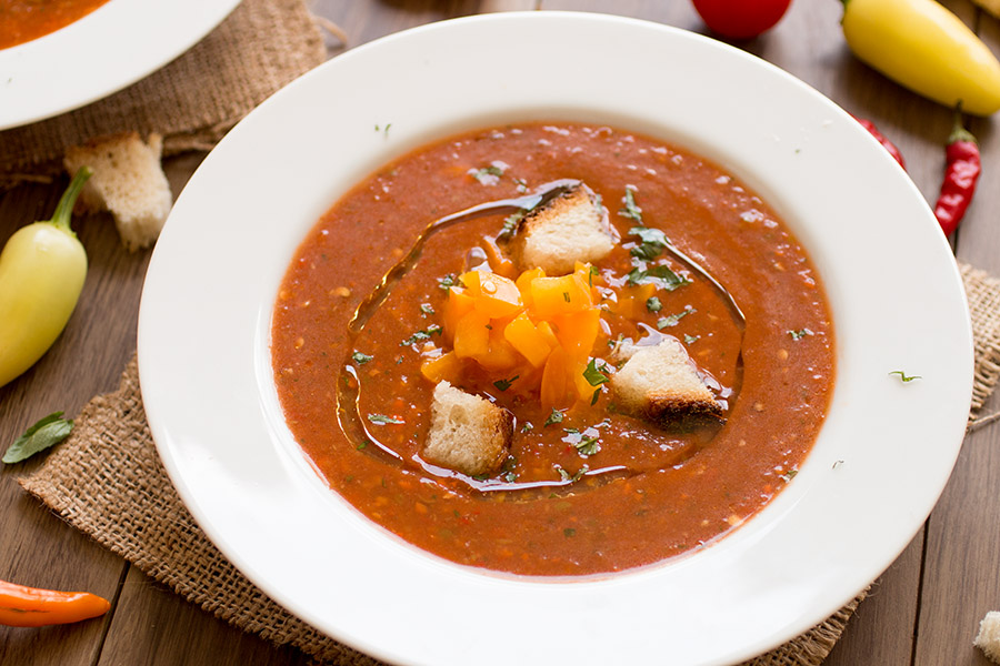 Fresh Tomato Chili Gazpacho served in a white bowl