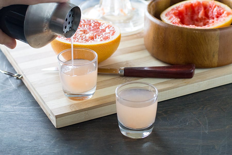 Pouring Grapefruit Kamikaze into shots