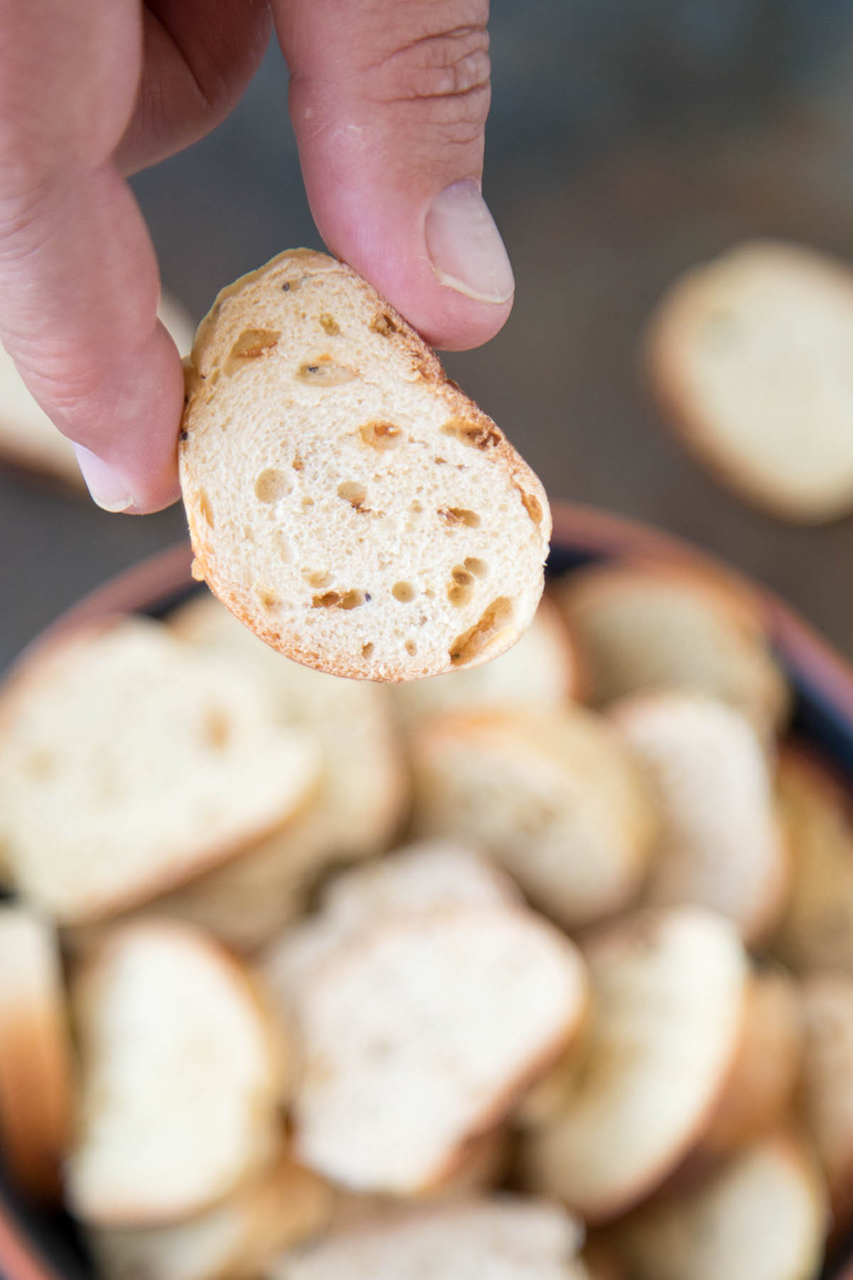 Holding Up an Amazing Homemade Bagel Chip