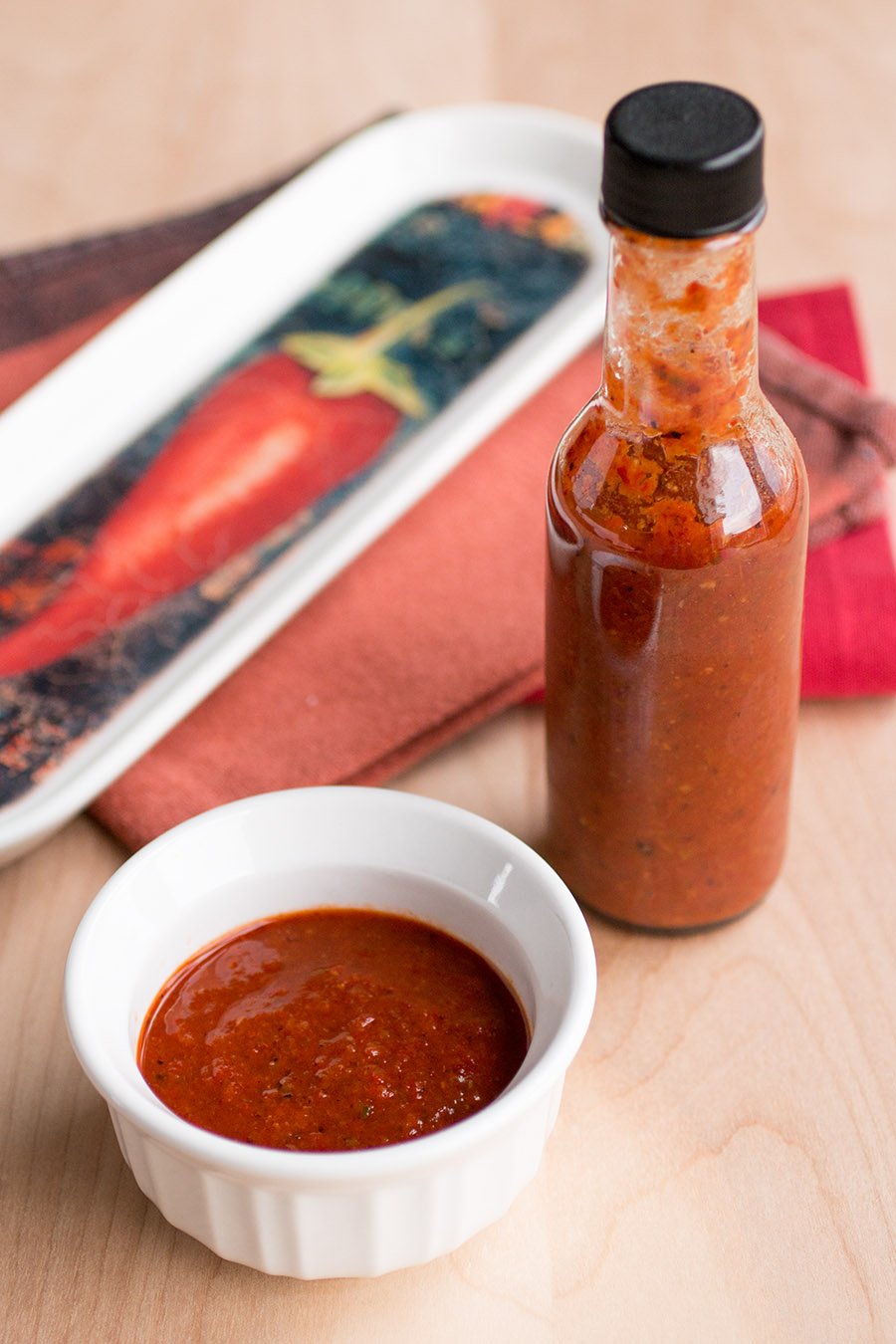 Super Hot Hot Sauce in a bowl and in a bottle.