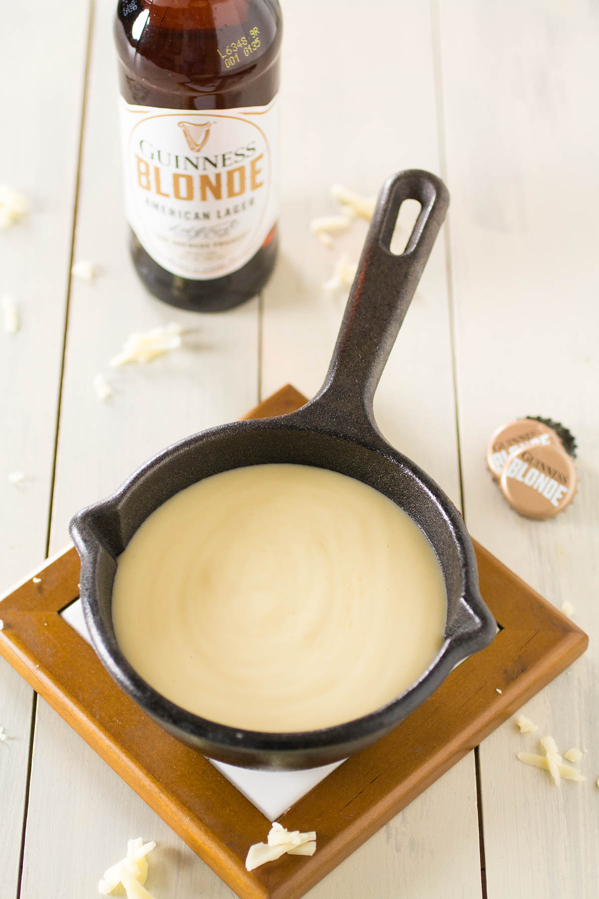 Beer Cheese sauce served in a small pan