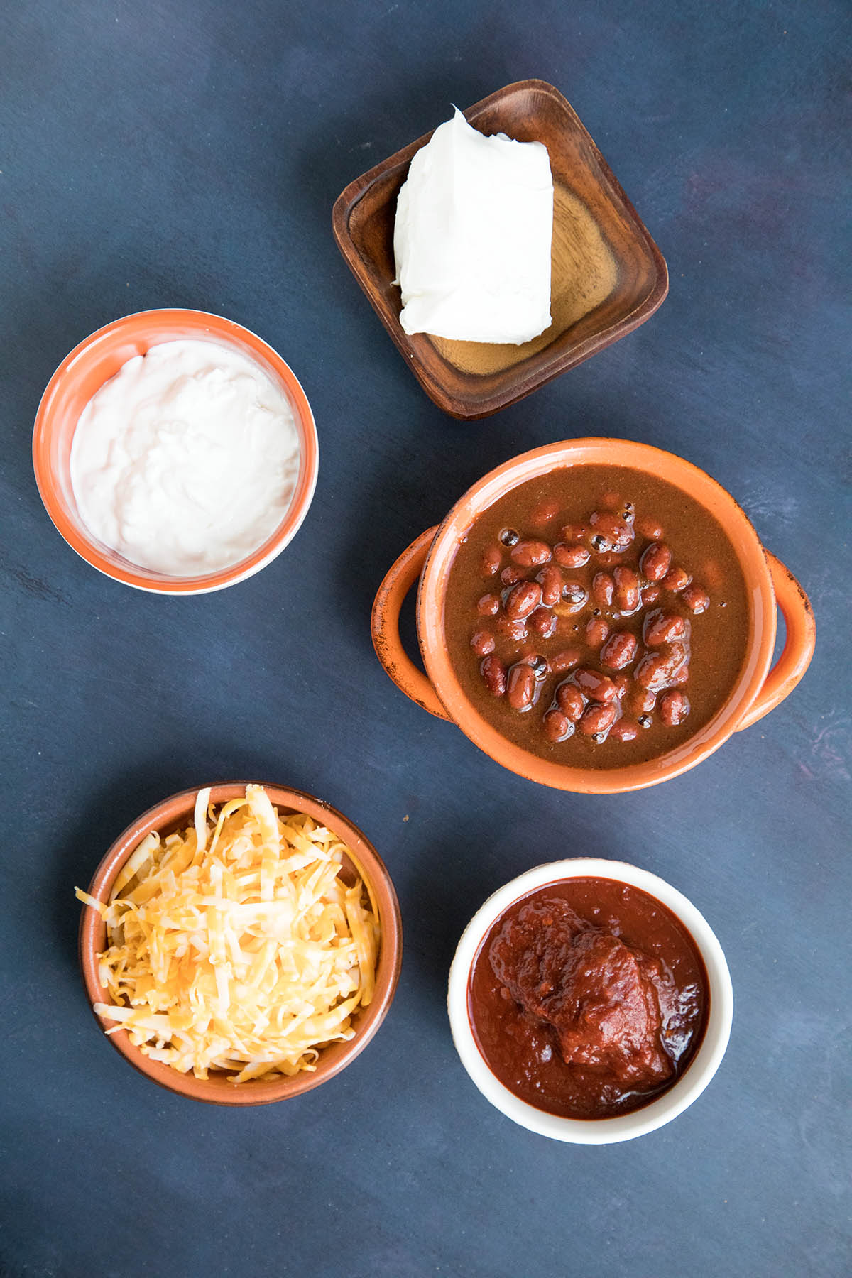 Ingredients needed to make Easy Cheesy Chipotle Bean Dip.