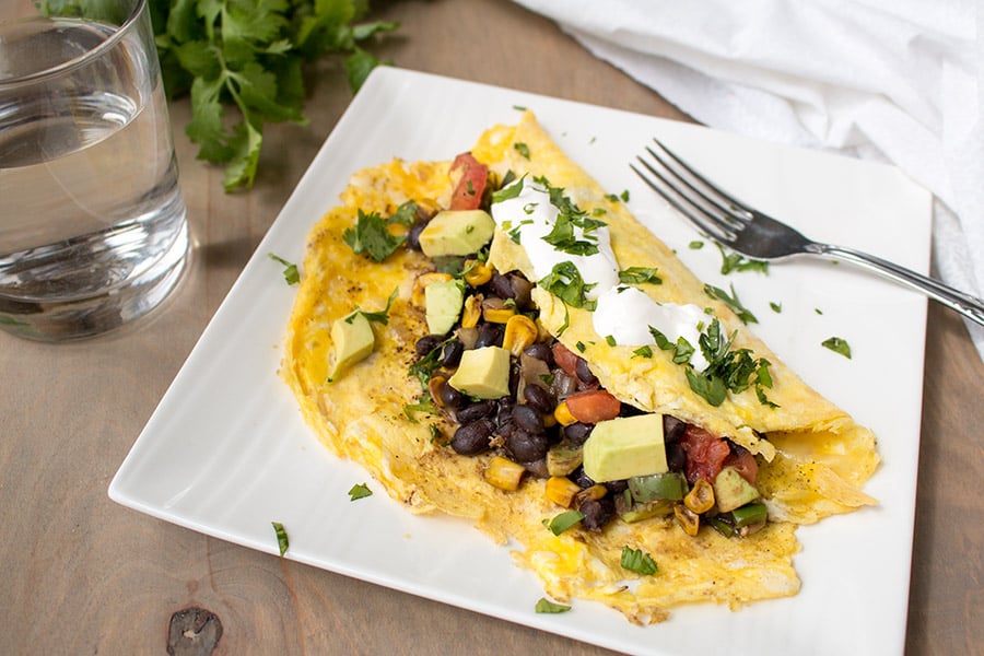 Loaded Mexican Omelette served on a big white plate