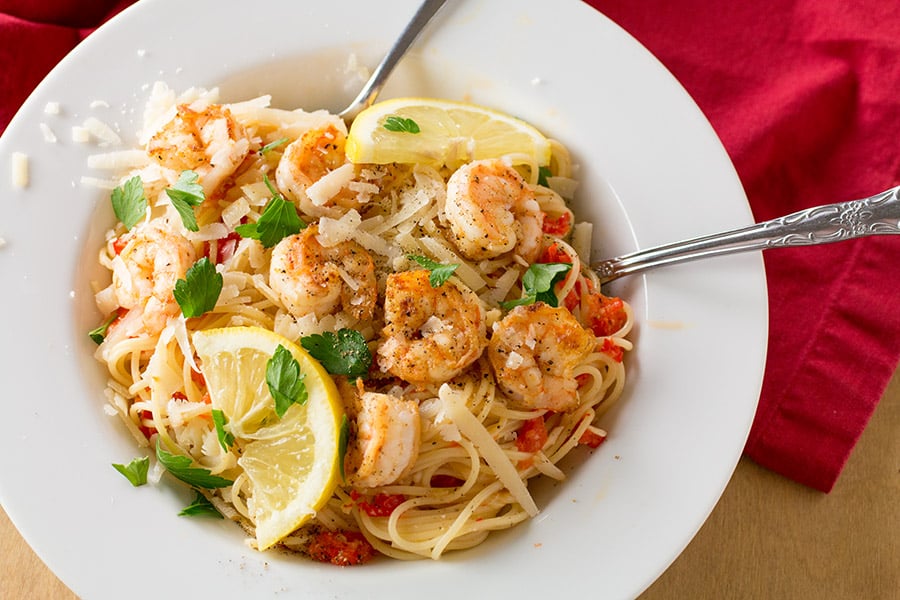 Shrimp Pasta with Creamy Roasted Red Pepper Sauce served in a white plate