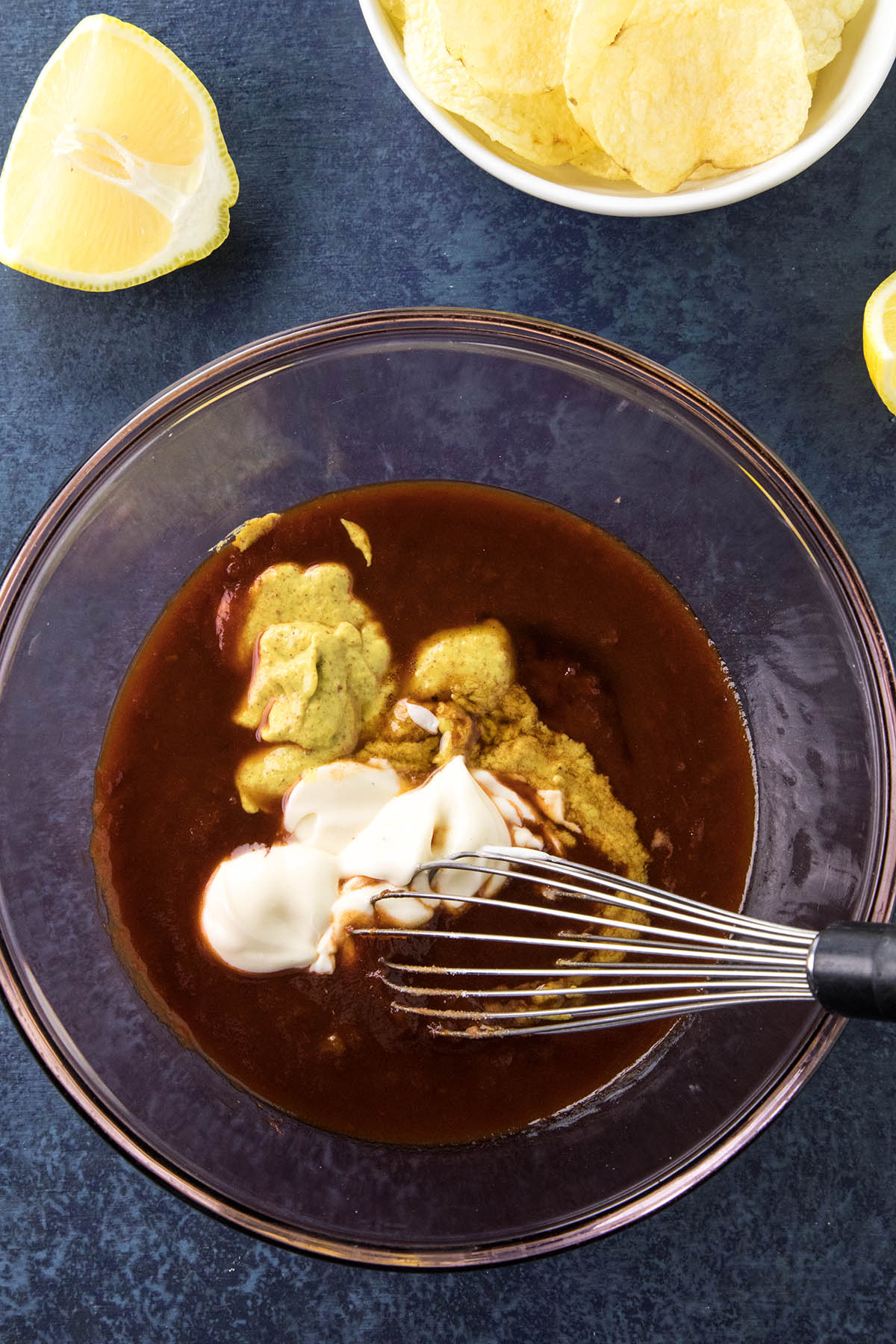 Mixing wet ingredients in a bowl.