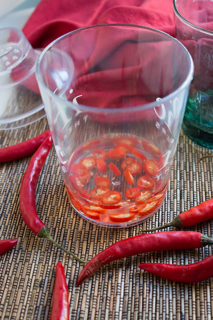 Infusing vodka with heat from the chilli peppers.