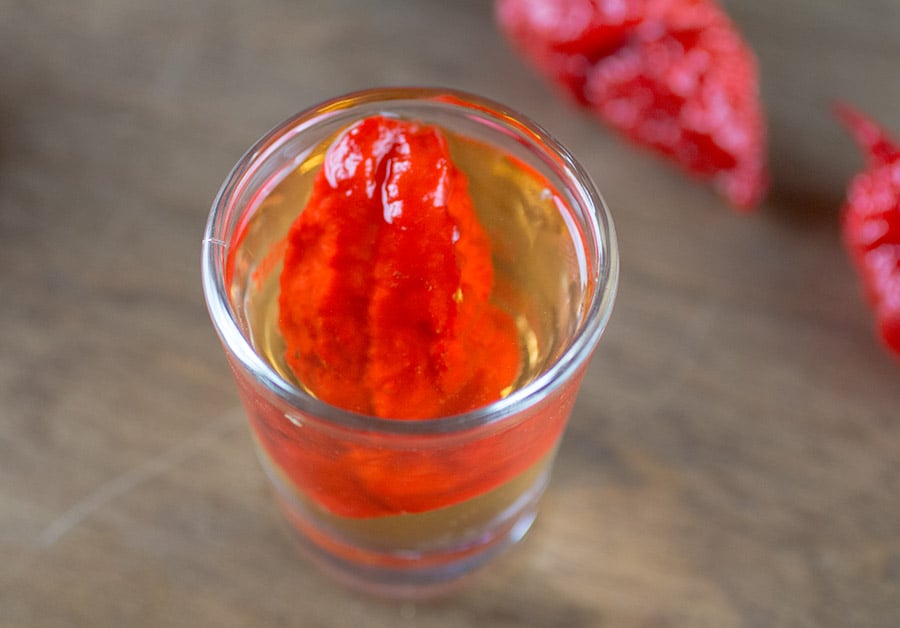 Scorpion Tongue Vodka Shot served with peppers around the shot