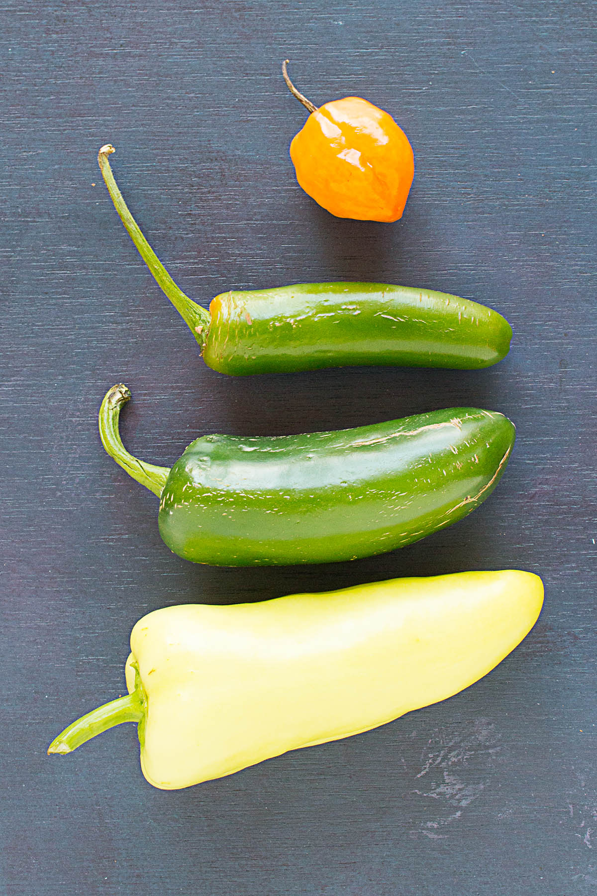 Raw peppers lined up