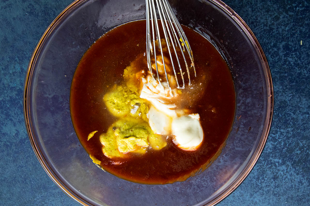 Whisking all the ingredients together, making Chipotle Honey Mustard Dip.