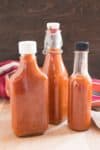 Sweet and Savory Chili Sauce served in three jars