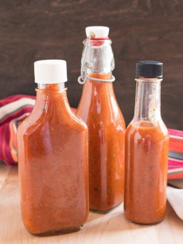 Sweet and Savory Chili Sauce served in three jars