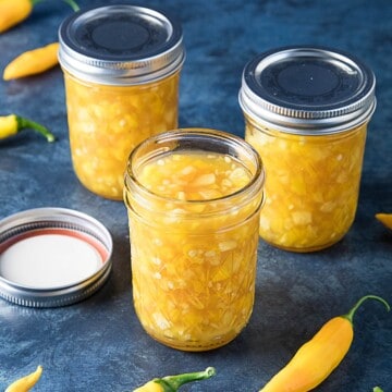Pineapple-Mango-Hot Pepper Jam served in three jars