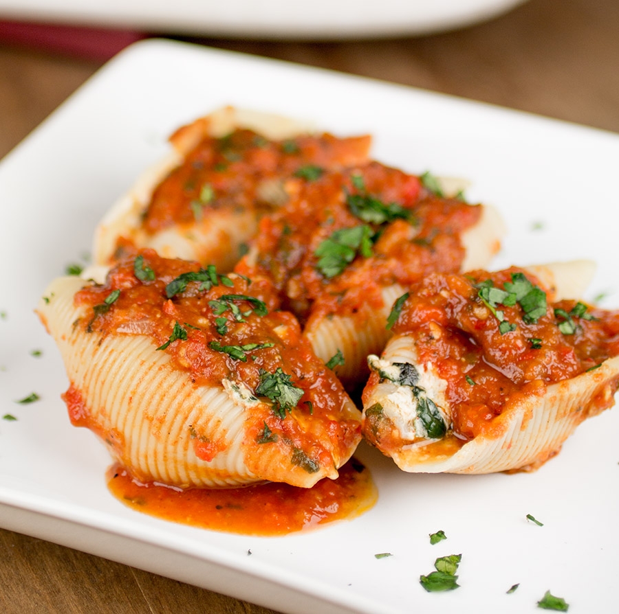 shrimp and goat cheese stuffed shells with roasted red pepper sauce