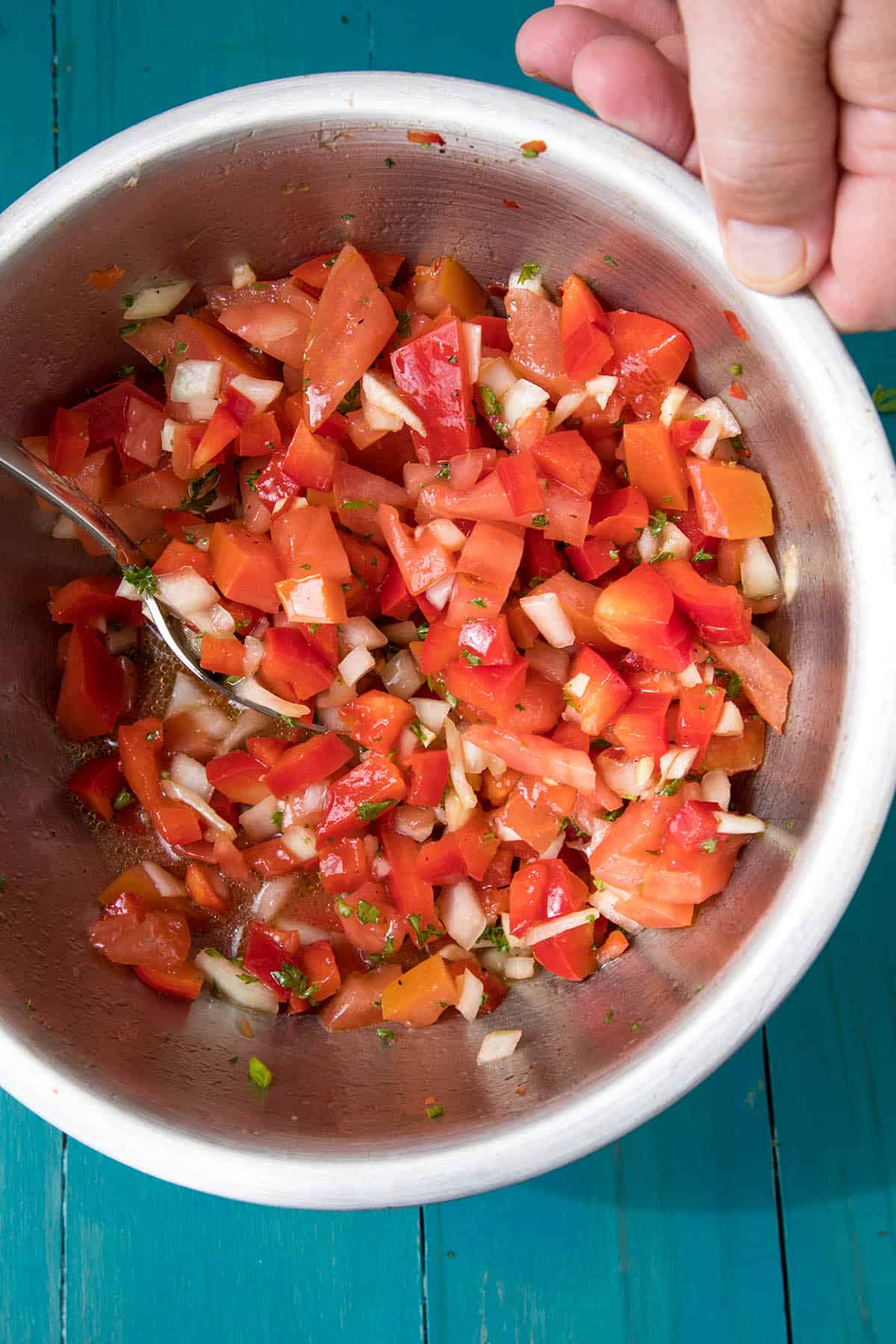 Mixing the Salsa Criolla to top my baked flounder fillets