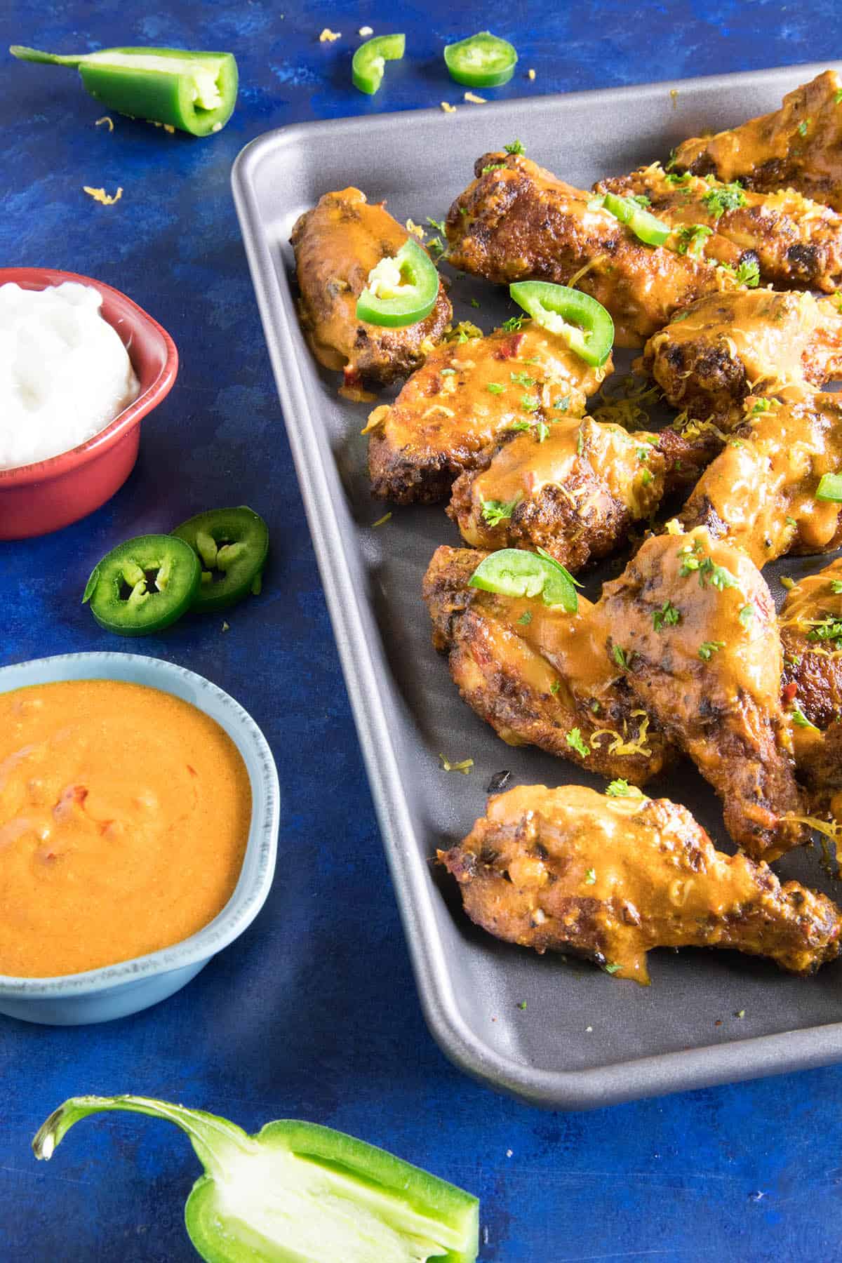 Jalapeno Cheddar Chicken Wings served with sauces