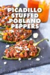 Picadillo Stuffed Poblano Peppers | ChiliPepperMadness.com #dinner #stuffedpeppers #poblanopeppers #MexicanFood #DinnerIdeas #EasyDinners #SpicyFood