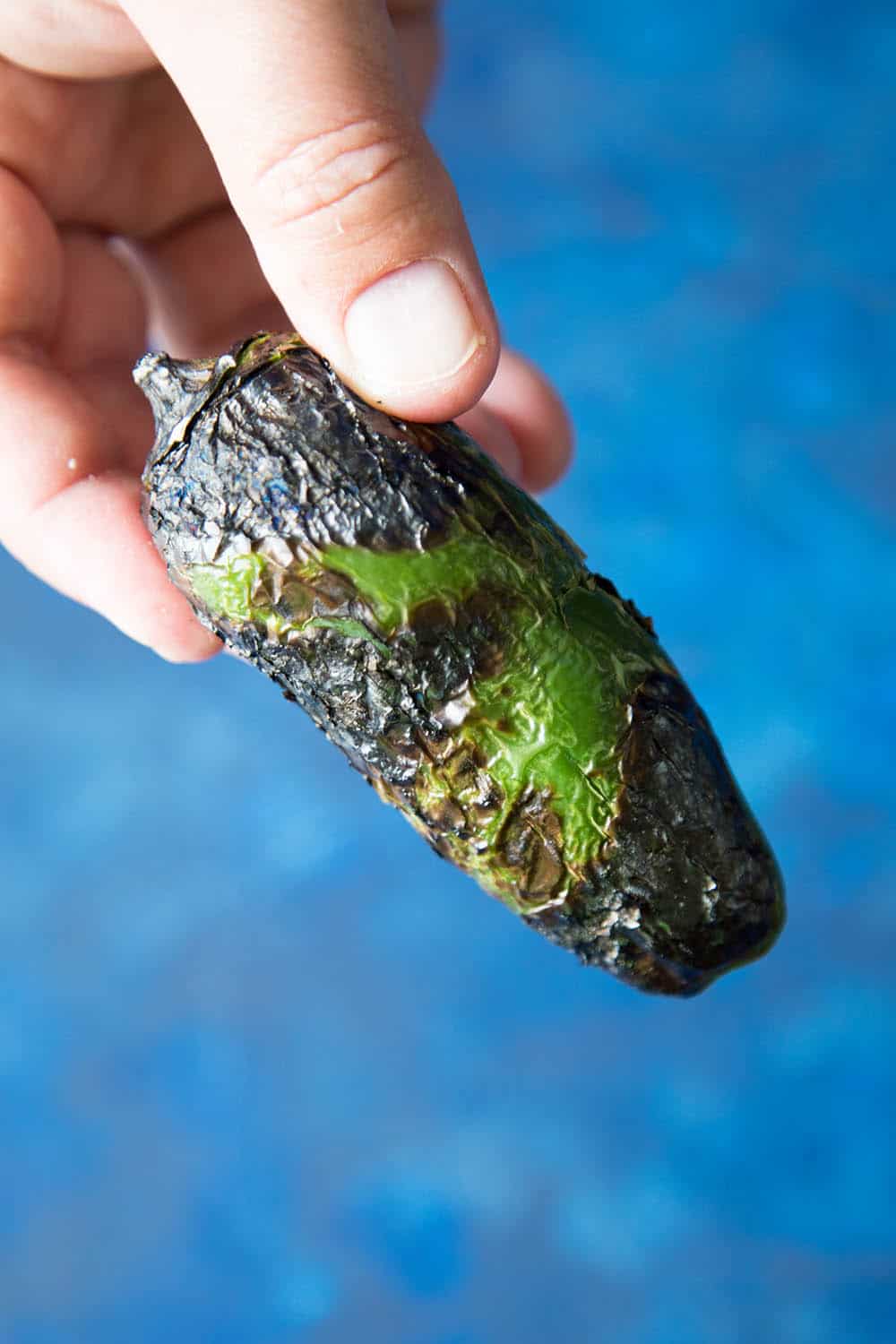Holding one of the Roasted Jalapeno Peppers