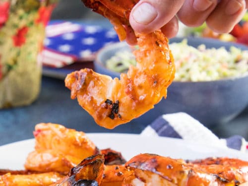 https://www.chilipeppermadness.com/wp-content/uploads/2018/06/Colossal-Grilled-Shrimp-in-Hand-500x375.jpg