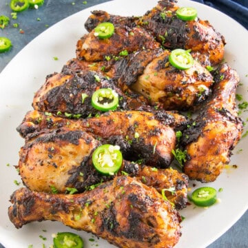 Grilled Harissa Chicken Legs served on a big plate