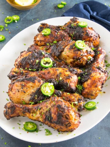 Grilled Harissa Chicken Legs served on a big plate